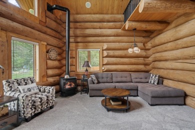 Escape the ordinary in this stunning log home sitting on just on Chewelah Golf and Country Club  in Washington - for sale on GolfHomes.com, golf home, golf lot