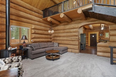 Escape the ordinary in this stunning log home sitting on just on Chewelah Golf and Country Club  in Washington - for sale on GolfHomes.com, golf home, golf lot