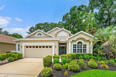 You are greeted by a lovely well maintained Front Garden. The on Halifax Plantation Golf Club in Florida - for sale on GolfHomes.com, golf home, golf lot