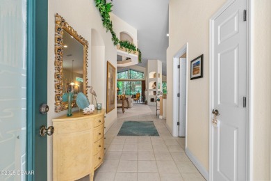 You are greeted by a lovely well maintained Front Garden. The on Halifax Plantation Golf Club in Florida - for sale on GolfHomes.com, golf home, golf lot