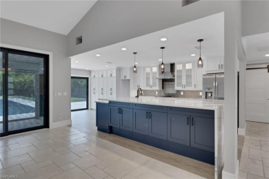 This beautifully redesigned home is nestled on an oversized lot on Imperial Golf Club in Florida - for sale on GolfHomes.com, golf home, golf lot