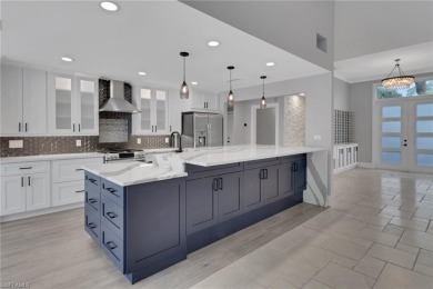 This beautifully redesigned home is nestled on an oversized lot on Imperial Golf Club in Florida - for sale on GolfHomes.com, golf home, golf lot
