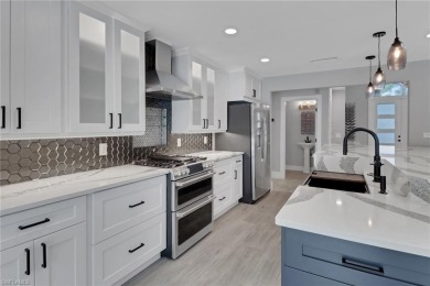 This beautifully redesigned home is nestled on an oversized lot on Imperial Golf Club in Florida - for sale on GolfHomes.com, golf home, golf lot