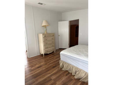 Discover this charming and well-maintained 3-bedroom home on Schalamar Creek Golf and Country Club in Florida - for sale on GolfHomes.com, golf home, golf lot
