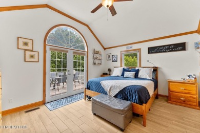 Welcome to 407 Kahite Trail, a stunning golf-front home, located on Tellico Village -The Links At Kahite Golf Course in Tennessee - for sale on GolfHomes.com, golf home, golf lot