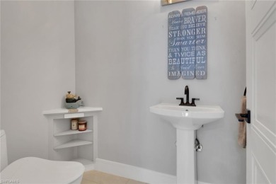 This beautifully redesigned home is nestled on an oversized lot on Imperial Golf Club in Florida - for sale on GolfHomes.com, golf home, golf lot