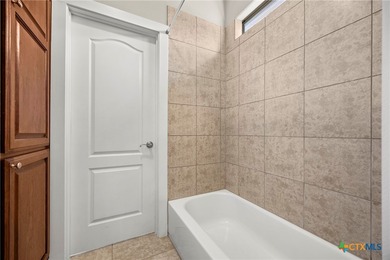 Nestled on a corner lot and along the 17th fairway of the on Apple Rock Golf Course - Horseshoe Bay in Texas - for sale on GolfHomes.com, golf home, golf lot