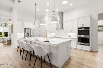 Custom Modern Luxury in Gated Plantation Bay! This 2023 on Plantation Bay Golf and Country Club in Florida - for sale on GolfHomes.com, golf home, golf lot