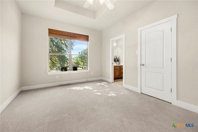 Nestled on a corner lot and along the 17th fairway of the on Apple Rock Golf Course - Horseshoe Bay in Texas - for sale on GolfHomes.com, golf home, golf lot