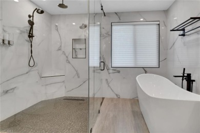 This beautifully redesigned home is nestled on an oversized lot on Imperial Golf Club in Florida - for sale on GolfHomes.com, golf home, golf lot