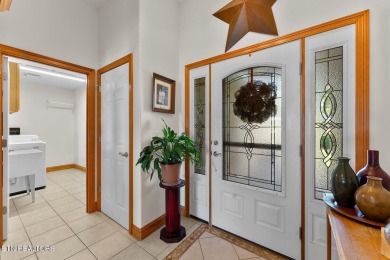 Welcome to 407 Kahite Trail, a stunning golf-front home, located on Tellico Village -The Links At Kahite Golf Course in Tennessee - for sale on GolfHomes.com, golf home, golf lot