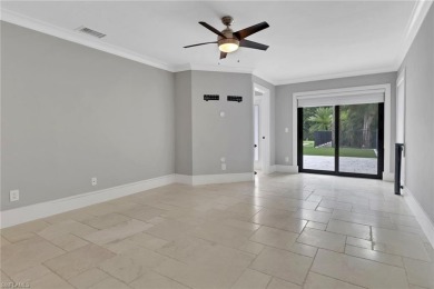 This beautifully redesigned home is nestled on an oversized lot on Imperial Golf Club in Florida - for sale on GolfHomes.com, golf home, golf lot