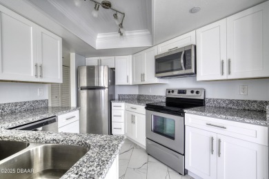 Embrace the best Florida lifestyle in this beautifully updated on Oceans Golf Club in Florida - for sale on GolfHomes.com, golf home, golf lot