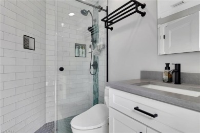This beautifully redesigned home is nestled on an oversized lot on Imperial Golf Club in Florida - for sale on GolfHomes.com, golf home, golf lot