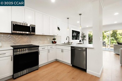 Reintroduced at $889,000, this updated 3BR/3BA Rossmoor townhome on Rossmoor Golf Course in California - for sale on GolfHomes.com, golf home, golf lot