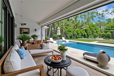 This beautifully redesigned home is nestled on an oversized lot on Imperial Golf Club in Florida - for sale on GolfHomes.com, golf home, golf lot