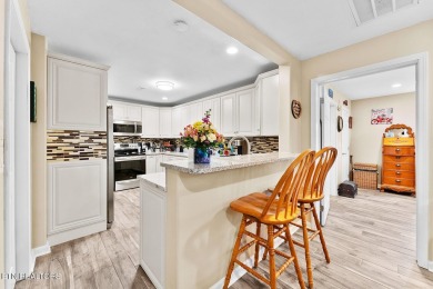 Welcome to 407 Kahite Trail, a stunning golf-front home, located on Tellico Village -The Links At Kahite Golf Course in Tennessee - for sale on GolfHomes.com, golf home, golf lot