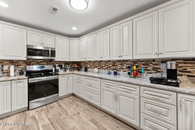 Welcome to 407 Kahite Trail, a stunning golf-front home, located on Tellico Village -The Links At Kahite Golf Course in Tennessee - for sale on GolfHomes.com, golf home, golf lot