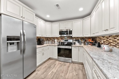 Welcome to 407 Kahite Trail, a stunning golf-front home, located on Tellico Village -The Links At Kahite Golf Course in Tennessee - for sale on GolfHomes.com, golf home, golf lot