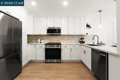 Reintroduced at $889,000, this updated 3BR/3BA Rossmoor townhome on Rossmoor Golf Course in California - for sale on GolfHomes.com, golf home, golf lot