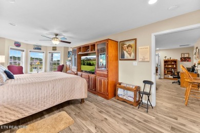 Welcome to 407 Kahite Trail, a stunning golf-front home, located on Tellico Village -The Links At Kahite Golf Course in Tennessee - for sale on GolfHomes.com, golf home, golf lot
