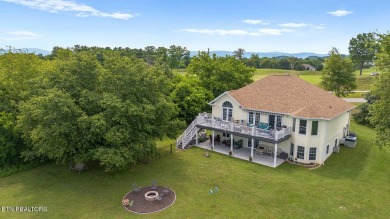 Welcome to 407 Kahite Trail, a stunning golf-front home, located on Tellico Village -The Links At Kahite Golf Course in Tennessee - for sale on GolfHomes.com, golf home, golf lot
