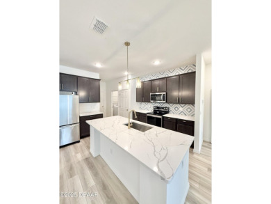 Experience refined, single-story living in this spacious 2,338 on The Grand Club Cypress Course in Florida - for sale on GolfHomes.com, golf home, golf lot