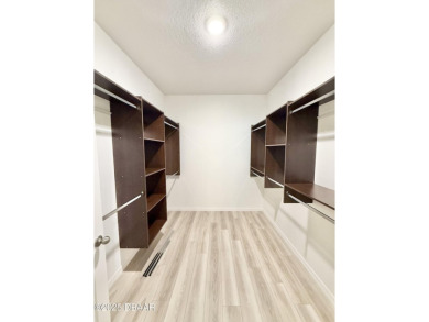 Experience refined, single-story living in this spacious 2,338 on The Grand Club Cypress Course in Florida - for sale on GolfHomes.com, golf home, golf lot