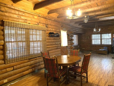 This authentic log cabin is priced to sell! Includes the on Holly Lake Ranch Golf Club in Texas - for sale on GolfHomes.com, golf home, golf lot