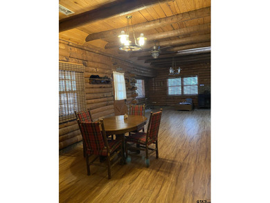 This authentic log cabin is priced to sell! Includes the on Holly Lake Ranch Golf Club in Texas - for sale on GolfHomes.com, golf home, golf lot