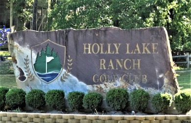 This authentic log cabin is priced to sell! Includes the on Holly Lake Ranch Golf Club in Texas - for sale on GolfHomes.com, golf home, golf lot