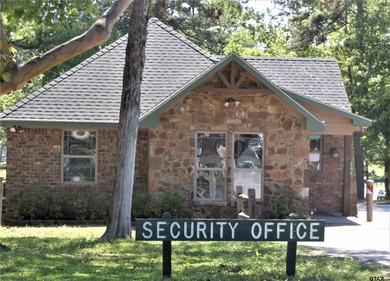 This authentic log cabin is priced to sell! Includes the on Holly Lake Ranch Golf Club in Texas - for sale on GolfHomes.com, golf home, golf lot