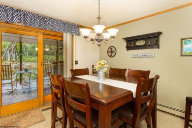 Welcome to 'Fireside'!  This lovely lake cottage nestled inside on Alpine Lake Resort in West Virginia - for sale on GolfHomes.com, golf home, golf lot