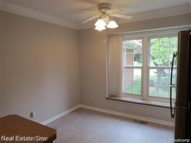 Welcome to this beautiful end unit condo in Country Club Village on Bushwood Golf Club in Michigan - for sale on GolfHomes.com, golf home, golf lot