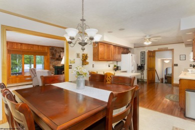 Welcome to 'Fireside'!  This lovely lake cottage nestled inside on Alpine Lake Resort in West Virginia - for sale on GolfHomes.com, golf home, golf lot