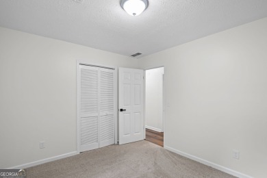 Welcome to your dream home! This charming 3-bedroom, 2-bath on Fairfield Plantation Golf and Country Club in Georgia - for sale on GolfHomes.com, golf home, golf lot
