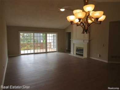 Welcome to this beautiful end unit condo in Country Club Village on Bushwood Golf Club in Michigan - for sale on GolfHomes.com, golf home, golf lot