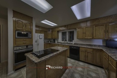 Step into this charming, expansive one-story brick home nestled on Olive Glenn Golf and Country Club in Wyoming - for sale on GolfHomes.com, golf home, golf lot
