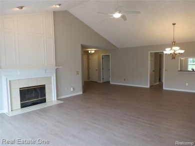 Welcome to this beautiful end unit condo in Country Club Village on Bushwood Golf Club in Michigan - for sale on GolfHomes.com, golf home, golf lot