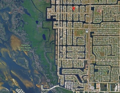 Cleared GULF ACCESS LOT with a NEWER SEAWALL in place. Located on Burnt Store Golf Club in Florida - for sale on GolfHomes.com, golf home, golf lot