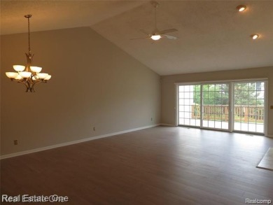 Welcome to this beautiful end unit condo in Country Club Village on Bushwood Golf Club in Michigan - for sale on GolfHomes.com, golf home, golf lot