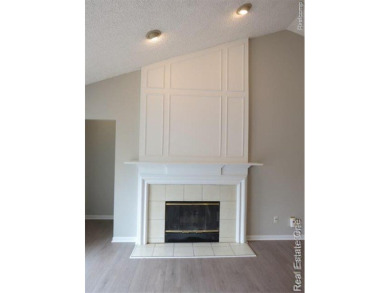 Welcome to this beautiful end unit condo in Country Club Village on Bushwood Golf Club in Michigan - for sale on GolfHomes.com, golf home, golf lot