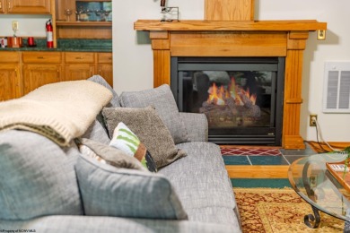 Welcome to 'Fireside'!  This lovely lake cottage nestled inside on Alpine Lake Resort in West Virginia - for sale on GolfHomes.com, golf home, golf lot