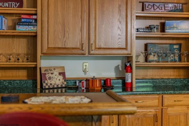 Welcome to 'Fireside'!  This lovely lake cottage nestled inside on Alpine Lake Resort in West Virginia - for sale on GolfHomes.com, golf home, golf lot