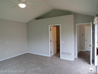 Welcome to this beautiful end unit condo in Country Club Village on Bushwood Golf Club in Michigan - for sale on GolfHomes.com, golf home, golf lot