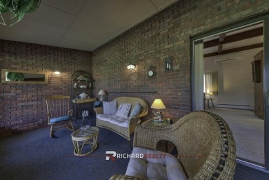 Step into this charming, expansive one-story brick home nestled on Olive Glenn Golf and Country Club in Wyoming - for sale on GolfHomes.com, golf home, golf lot