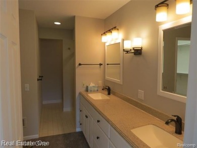 Welcome to this beautiful end unit condo in Country Club Village on Bushwood Golf Club in Michigan - for sale on GolfHomes.com, golf home, golf lot