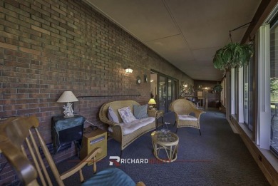 Step into this charming, expansive one-story brick home nestled on Olive Glenn Golf and Country Club in Wyoming - for sale on GolfHomes.com, golf home, golf lot