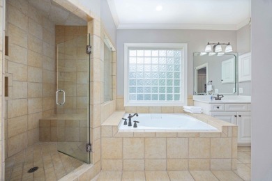 Timeless design, smart functionality, and peaceful lake and golf on Maple Ridge Golf Club in Georgia - for sale on GolfHomes.com, golf home, golf lot