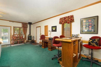Welcome to 'Fireside'!  This lovely lake cottage nestled inside on Alpine Lake Resort in West Virginia - for sale on GolfHomes.com, golf home, golf lot